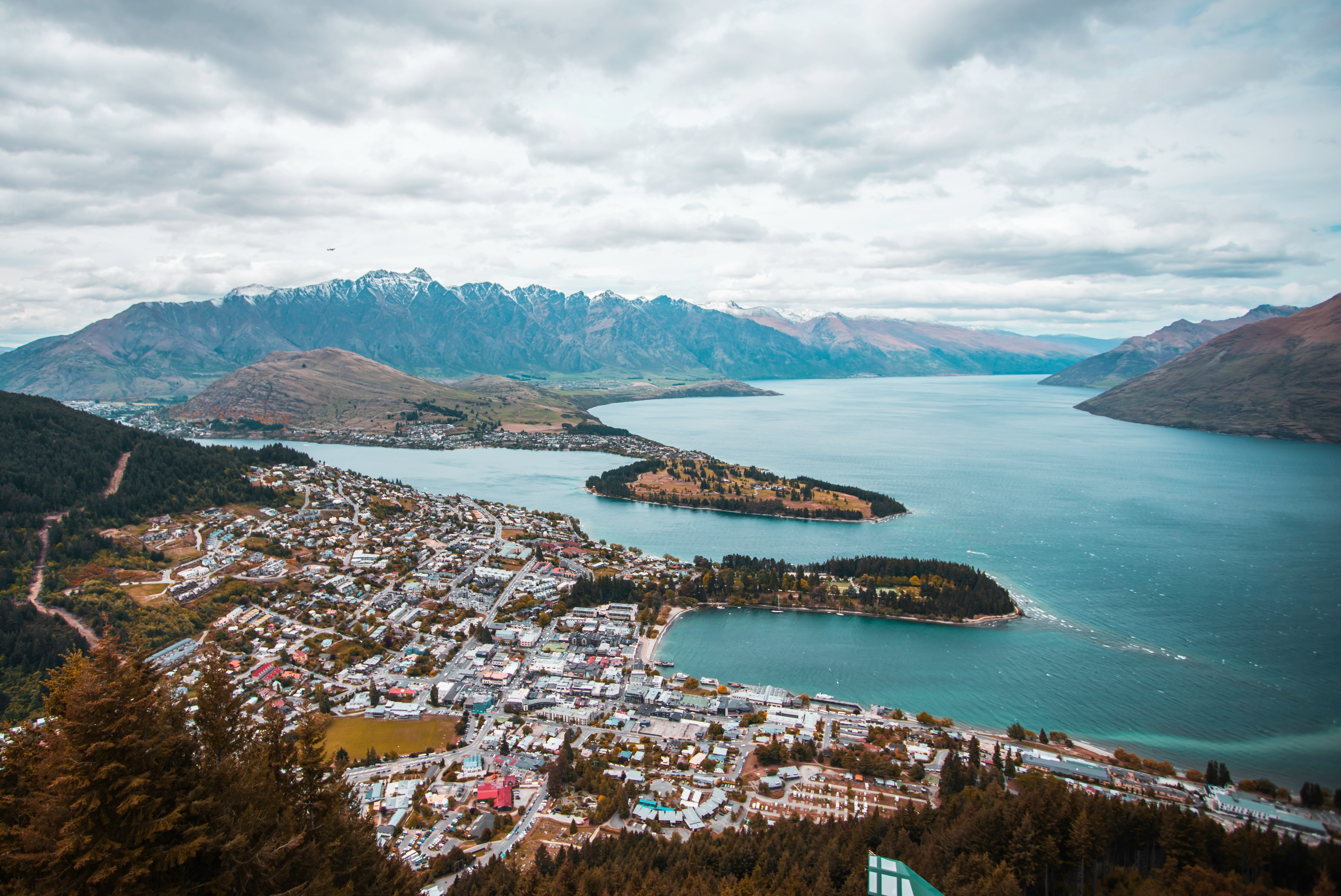 Aerial view over Queenstown town, Lake Wakatipu and the Remarkables mountain range, New Zealand